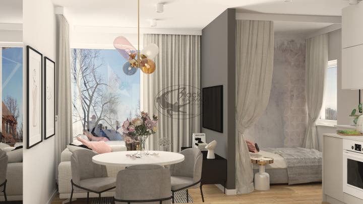 Projekt salonu w kobiecej kawalerce w Warszawie