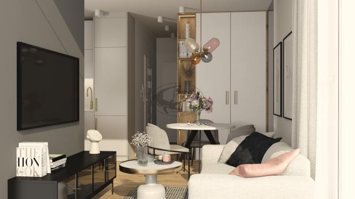 Projekt salonu w kobiecej kawalerce w Warszawie